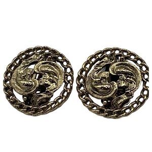 Vintage Kramer gold colored cut out design clip earrings.